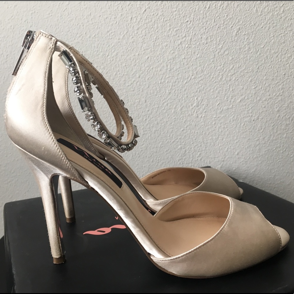 Nina “Maraya” heels with ankle strap in Ivory